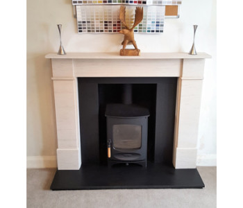 Charnwood C4 Woodburner in black with - Flat Front Victorian and Honed Black Granite hearths, slips and header fitted by our installers in Shalford near Guildford, Surrey.